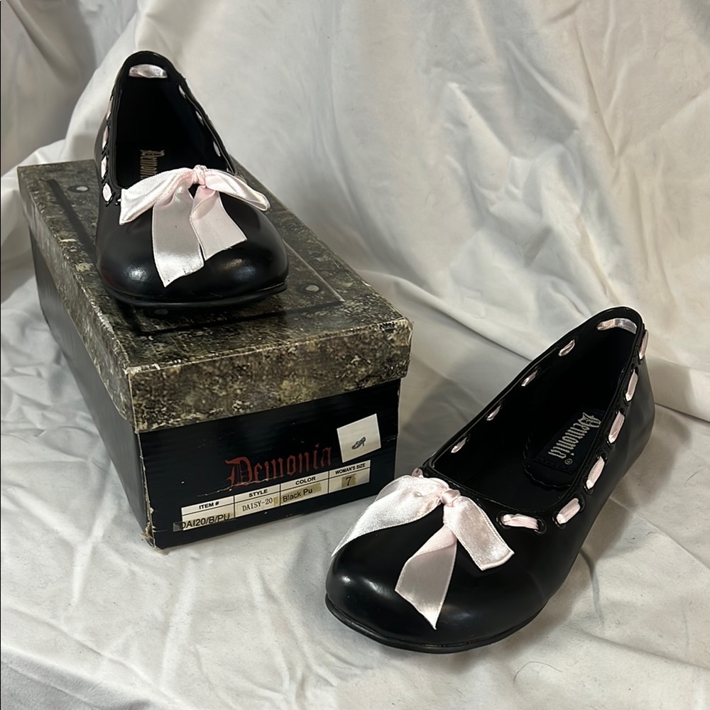 Brand New Demonia Daisy 20 Women's Black Ballet Flats with Pink Ribbon